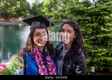 university students attending graduation ceremony at Sonoma State University in Rohnert Park in Sonoma County in California United States Stock Photo