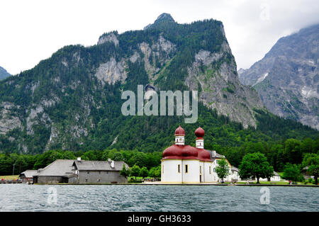 geography / travel, Germany, Bavaria, pilgrimage church St. Bartholomae from the 12th century in front of the east wall of the Watzmann (peak), Koenigssee, Berchtesgaden National Park Berchtesgaden, Additional-Rights-Clearance-Info-Not-Available Stock Photo
