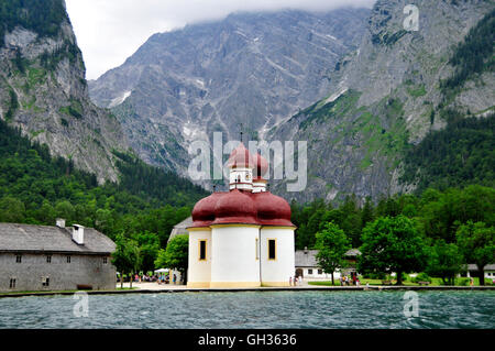 geography / travel, Germany, Bavaria, pilgrimage church St. Bartholomae from the 12th century in front of the east wall of the Watzmann (peak), Koenigssee, Berchtesgaden National Park Berchtesgaden, Additional-Rights-Clearance-Info-Not-Available Stock Photo