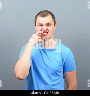 Man biting his nails - Bad habit concept Stock Photo