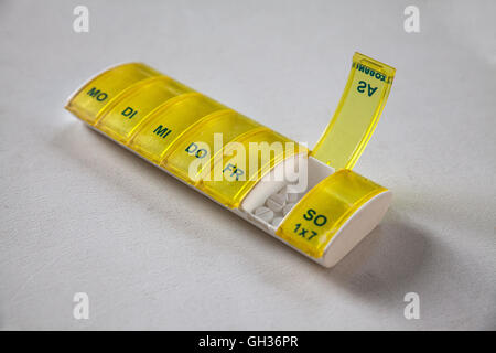 Pill box with weekdays (German abbreviations) Stock Photo