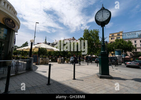 A large street clock in Hviezdoslavovo námestie (Hviezdoslavovo Square), one of the best-known squares in Bratislava, Slovakia. Stock Photo