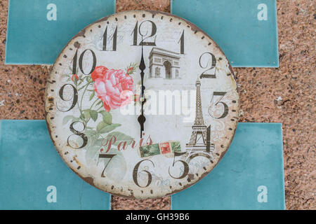Vintage clock show 6 am or pm on wall. Stock Photo