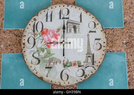 Vintage clock show 9 am or pm on wall. Stock Photo