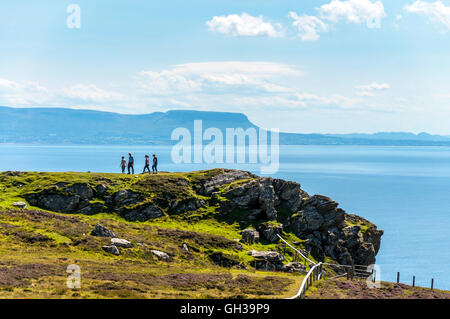 Walkers at Slieve League sea cliffs in County Donegal, Ireland Stock Photo