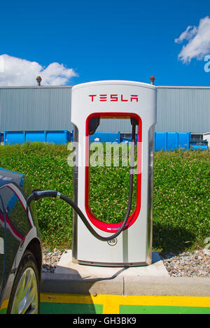 ZURICH - July 30:  Tesla Supercharger station on July 30, 2016 in Zurich, Switzerland. Tesla motors develops network of the char Stock Photo