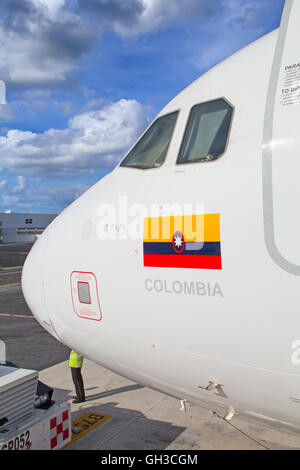 CANCUN - OCTOBER 19: Avianca A-320 disembarking passengers after arriving to Cancun on October 19, 2014 in Cancun, Mexico. Avian Stock Photo