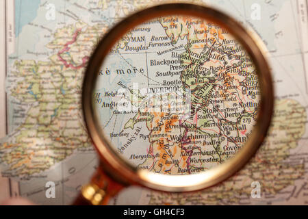 Magnifying glass in front of a Liverpool map Stock Photo