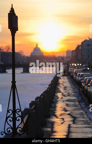 St. Petersburg, urban landscape, Fontanka Embankment at sunset in winter. Photo in low key Stock Photo