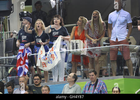 Mark and Caroline Peaty (left) with girlfriend Anna Zair in the BBC studio as they await the Men's 100m Final where their son will Adam will race for an Olympic medal on the second day of the Rio Olympics Games, Brazil. PRESS ASSOCIATION Photo. Picture date: Monday August 8, 2016. Photo credit should read: Owen Humphreys/PA Wire. Stock Photo