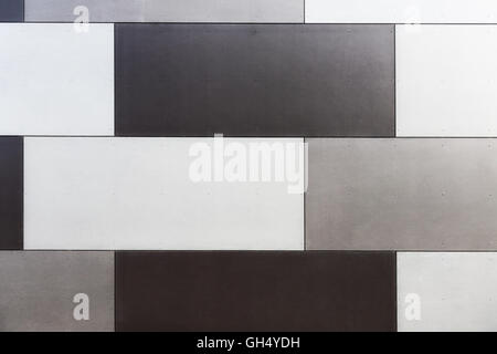 Background texture of tiled panels at the wall. Modern building exterior Stock Photo