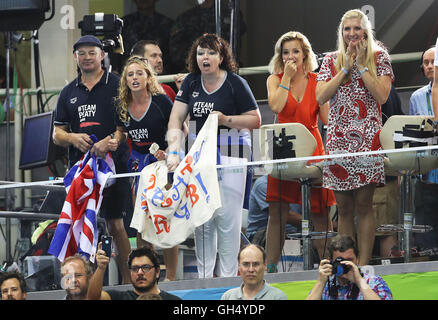 Mark and Caroline Peaty (left) with girlfriend Anna Zair in the BBC studio as they await the Men's 100m Final where their son will Adam will race for an Olympic medal on the second day of the Rio Olympics Games, Brazil. PRESS ASSOCIATION Photo. Picture date: Monday August 8, 2016. Photo credit should read: Owen Humphreys/PA Wire. Stock Photo