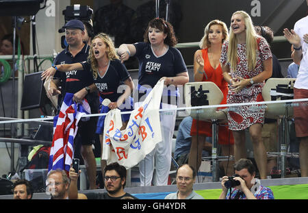 Mark and Caroline Peaty (left) with girlfriend Anna Zair in the BBC studio as they await the Men's 100m Final where their son will Adam will race for an Olympic medal on the second day of the Rio Olympics Games, Brazil. PRESS ASSOCIATION Photo. Picture date: Monday August 8, 2016. Photo credit should read: Owen Humphreys/PA Wire. Stock Photo