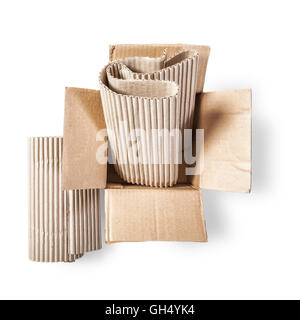 Open cardboard box and corrugated role. Packaging material. Objects group  isolated on white background with clipping path Stock Photo