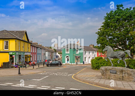 Colourful houses and a bronze statue of a Welsh cob stallion overlook Alban Square in Aberaeron, Ceredigion, Wales, UK Stock Photo