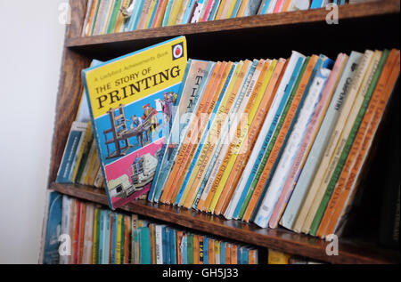 Bookshelf full of Ladybird books for children Stock Photo