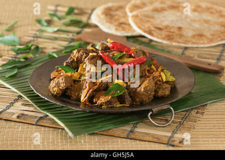 Kerala beef fry. Beef Ularthiyathu. India Food Stock Photo