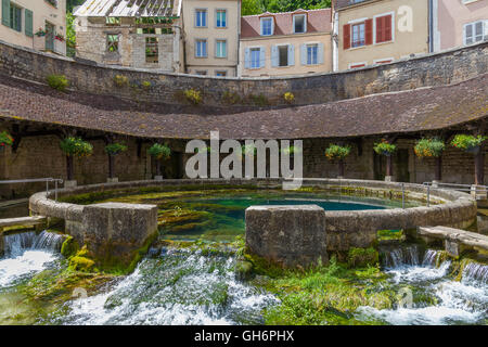 La Fosse Dionne  is a karst spring located in downtown Tonnerre. France. Stock Photo