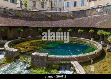 La Fosse Dionne  is a karst spring located in downtown Tonnerre. France. Stock Photo