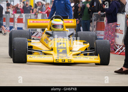 ATS F1 racing car of Christian Perrier in the paddock at FIA Masters Historic Formula 1 race, 2016 Silverstone Classic event. Stock Photo