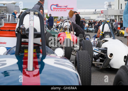 Formula Junior racing cars lined up in the paddock at the 2016 Silverstone Classic event, England, UK Stock Photo