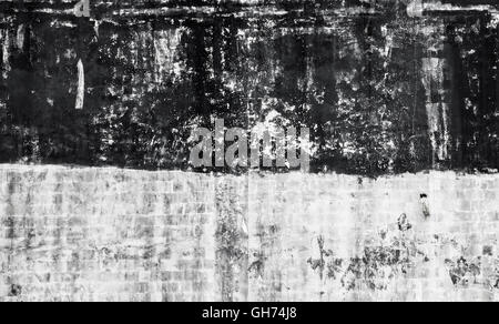Grungy concrete wall with black paint area, background photo texture Stock Photo