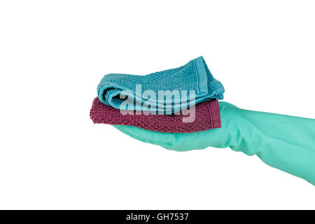 Human hand with rubber glove holding cleaning towels, isolated on white background. Stock Photo