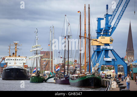 Rostock, Germany. 08th Aug, 2016. The first of the traditional sail boats arriving in the city harbor for the 26th Hanse Sail event in Rostock, Germany, 08 August 2016. From 11 until 14 August 2016 more than one million visitors are expected at the 26th Hanse Sail in Rostock. Organizers expect about 180 historic boats and ships to be on show at the the largest folk and sailors festival in Mecklenburg-Western Pomerania. Photo: JENS BUETTENER/dpa/Alamy Live News Stock Photo