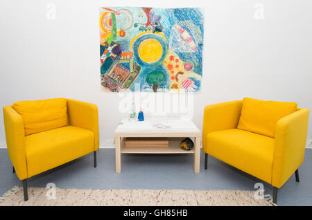 Hanover, Germany. 05th Aug, 2016. Yellow chairs in a treatment room for families in Hanover, Germany, 05 August 2016. The Network for Traumatized Refugees in Lower Saxony sees to the urgent treatment and placement in psychological care for traumatized refugees. Photo: SEBASTIAN GOLLNOW/dpa/Alamy Live News Stock Photo
