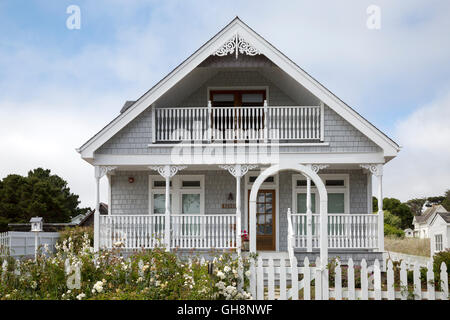 Cute Victorian home with picket fence and flowers in Mendocino, California. Stock Photo