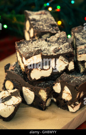 Rocky road crunch bars, christmas dessert made with chocolate,  marshmallow, hazelnut, biscuit and glace cherries, toned Stock Photo