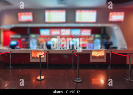 Blur of Defocus Background  People Waiting in Movie or Cinema Complex Lounge Stock Photo