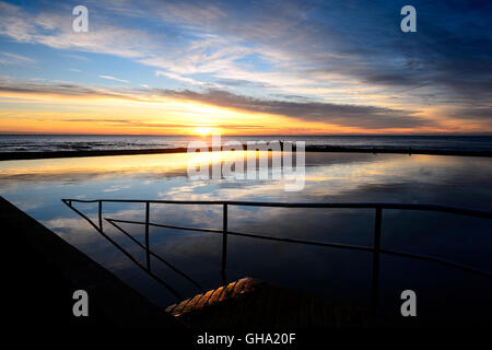 Sunrise over Kiama rock pool, Illawarra Coast, New South Wales, NSW, Australia Stock Photo