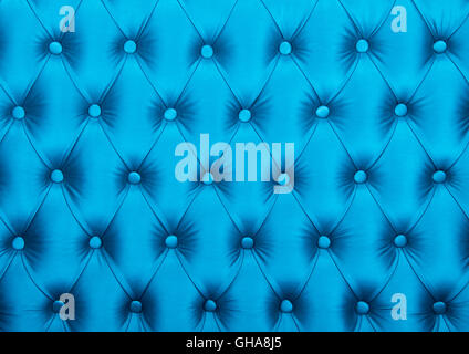 Blue capitone textile background, retro Chesterfield style checkered soft tufted fabric furniture diamond pattern decoration wit Stock Photo