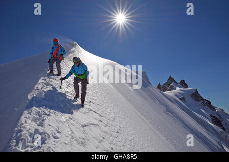 geography / travel, France, Alpinist on the aiguille du Midi (3848 m) to aiguille du Plan (3673 m) ridge in summer, Chamonix, Mont-Blanc range, Additional-Rights-Clearance-Info-Not-Available Stock Photo