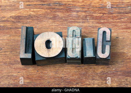 logic word  made from scattered wooden letterpress type on grunge wood Stock Photo