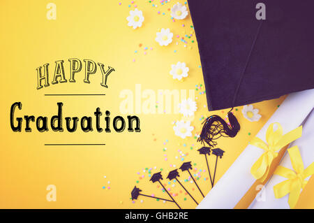 Yellow black and white theme graduation background with decorated borders on yellow background, with applied retro style filters Stock Photo