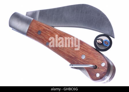 Utility knife tool with cable closeup isolated on white background Stock Photo