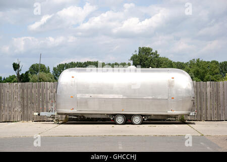Silver-colored caravan Stock Photo