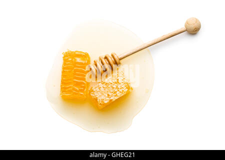 Fresh honey with honeycomb isolated on white background. Stock Photo