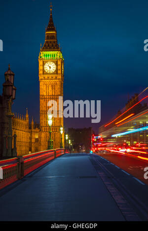View of Big Ben from Westminster Bridge and night traffic. Stock Photo
