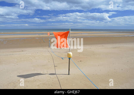 Orange Beach Flag Stock Photo