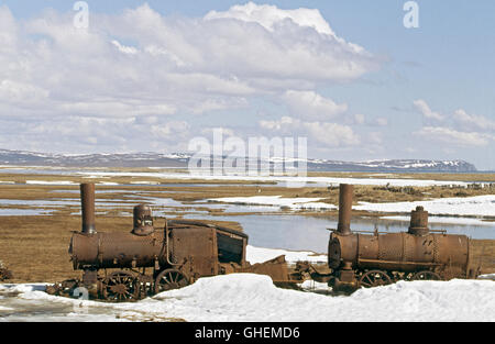 Three Forneys steam locomotives have lain dissolving into the Arctic Tundra for a hundred years. Stock Photo