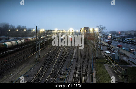 Sorting railway station with cargo trains at night Stock Photo