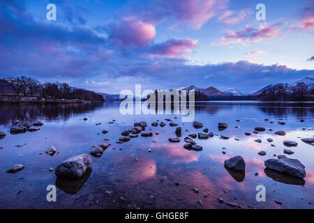 Pink and purple clouds over Derwentwater after sunset viewed from the Crow Park on the northern shore in Keswick, Lake District National Park, England Stock Photo
