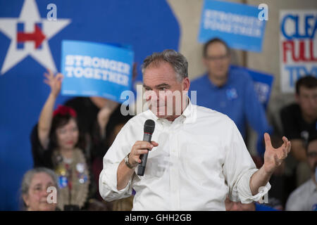 Democratic VP nominee Tim Kaine encourages volunteers at an Austin phone bank during a fund-raising swing through Texas. Stock Photo