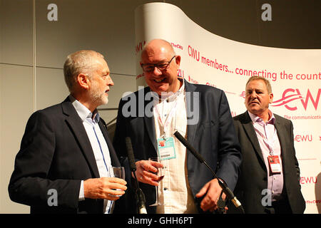 Liverpool, UK. 26th September, 2016. Jeremy Corbyn talks with Dave Ward leaders of the Communications Union at a fringe meeting at the Labour Party Conference in Liverpool. Credit:  Rupert Rivett/Alamy Live News Stock Photo