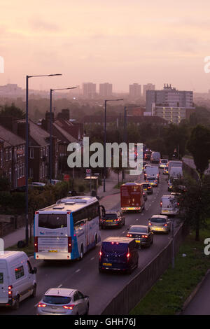 Acton, London, September 28th 2016. UK Weather: Traffic on the A40 rumbles into the capital with distant skyscrapers in the city appearing through the haze as a new day dawns in London. Credit:  Paul Davey/Alamy Live News Stock Photo