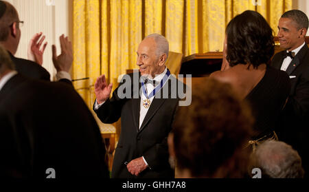 United States President Barack Obama awards the Presidential Medal of Freedom to President Shimon Peres of Israel during a dinner in his honor in the East Room of the White House in Washington, D.C. on Wednesday, June 13, 2012..Credit: Martin Simon / Pool via CNP /MediaPunch Stock Photo