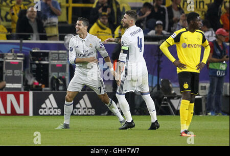 Dortmund, Germany. 27th September, 2016. Dortmund, Deutschland. 27th Sep, 2016. Cristian Ronaldo (Real Madrid) (L) celebrates scoring the 1:0 goal with Sergio Ramos (Real Madrid) during the Champions League match between Borussia Dortmund and Real Madrid, Signal Iduna Park in Dortmund on September 27, 2016. © dpa picture alliance/Alamy Live News Credit:  dpa/Alamy Live News Stock Photo